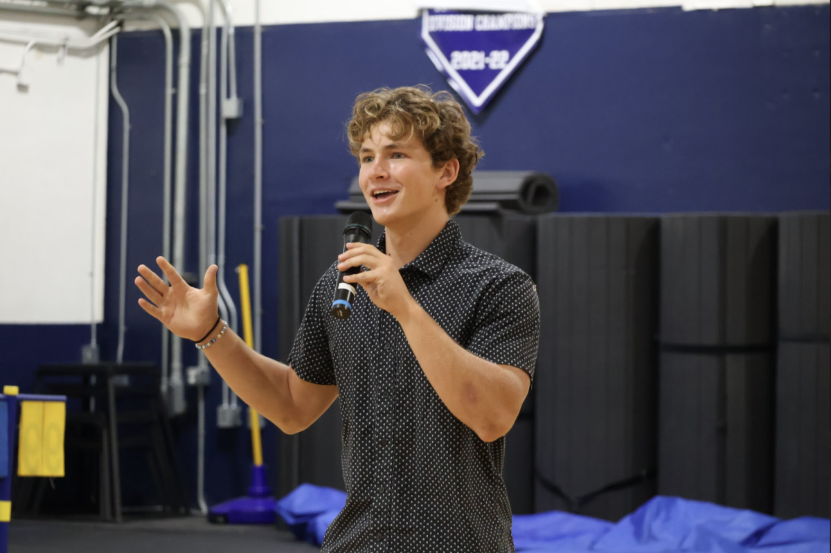 Junior Tyler Lamb, who is running for senior class vice president, gives his campaign speech on April 23.